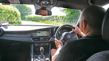 Alfa Romeo Giulia Quadrifoglio long-term - over the shoulder driving